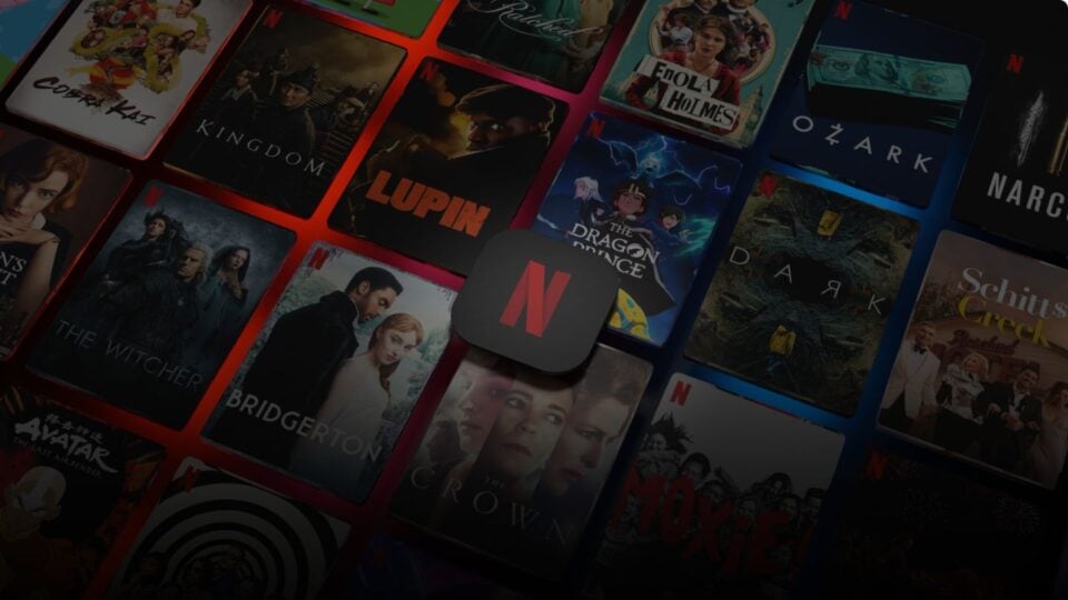 An array of netflix shows posters with the netflix logo in the middle