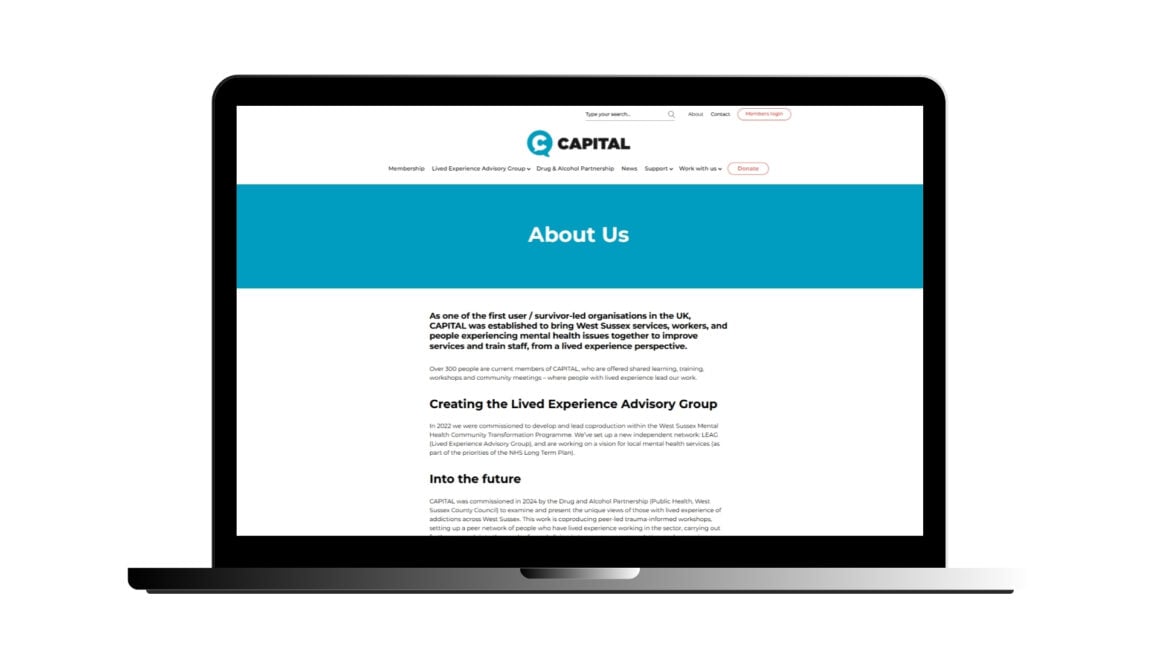 A laptop showing the new CAPITAL site