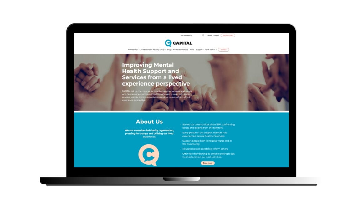 A laptop showcasing CAPITAL's new website