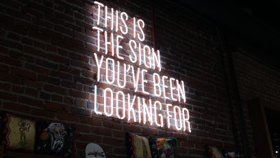 Neon sign saying 'This is the sign you've been looking for'